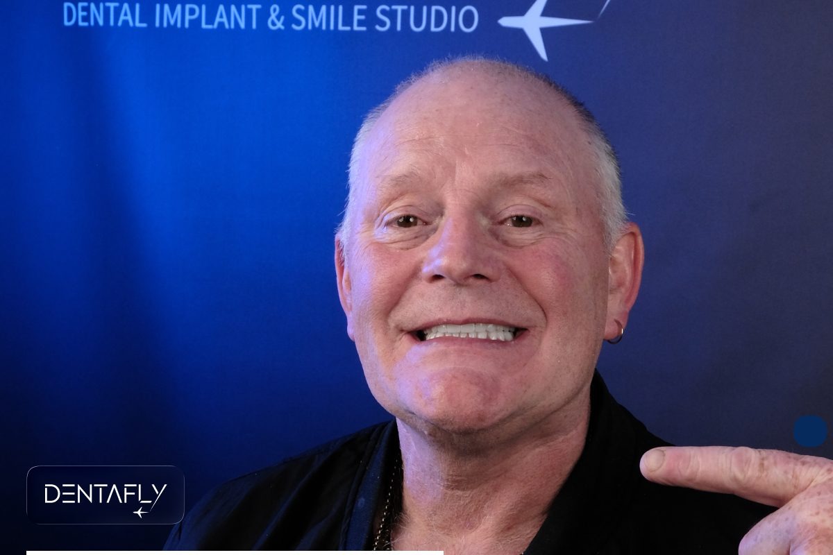 Happy UK patient showing successful smile after bone grafting and dental implants at Dentafly